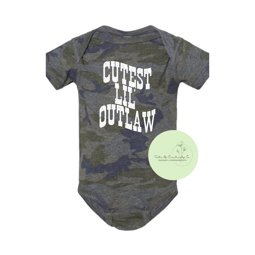 "Cutest Lil' Outlaw" Onesie™, Cute Baby Apparel, Apparel for Baby, Infant Bodysuit, Camo Cowgirl Collection, Disco Cowgirl Collection
