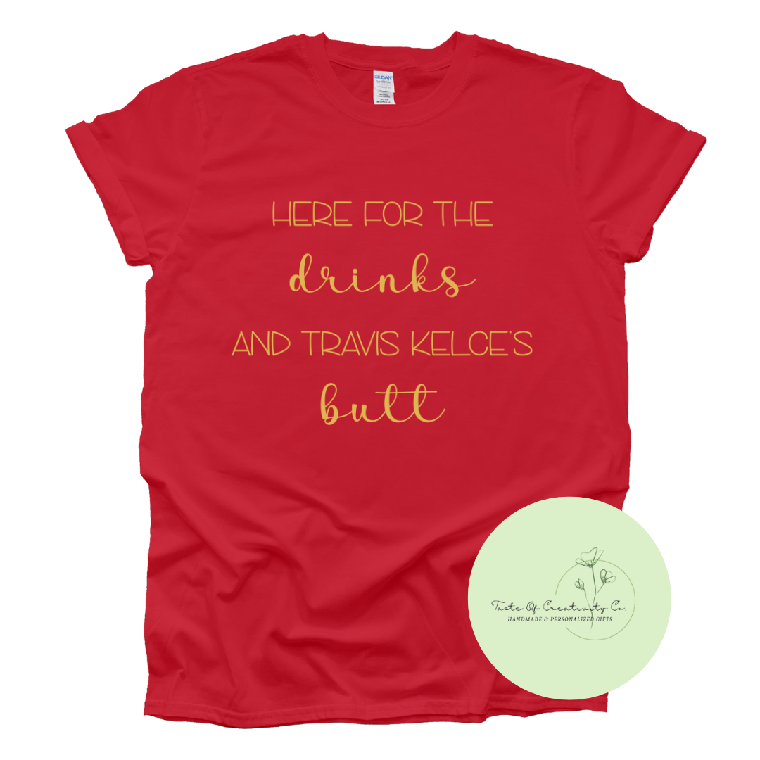 "Here For The Drinks and Travis Kelce's Butt" T-Shirt, Super Bowl Apparel *10% OF PROCEEDS DONATED TO KIDSPORT*